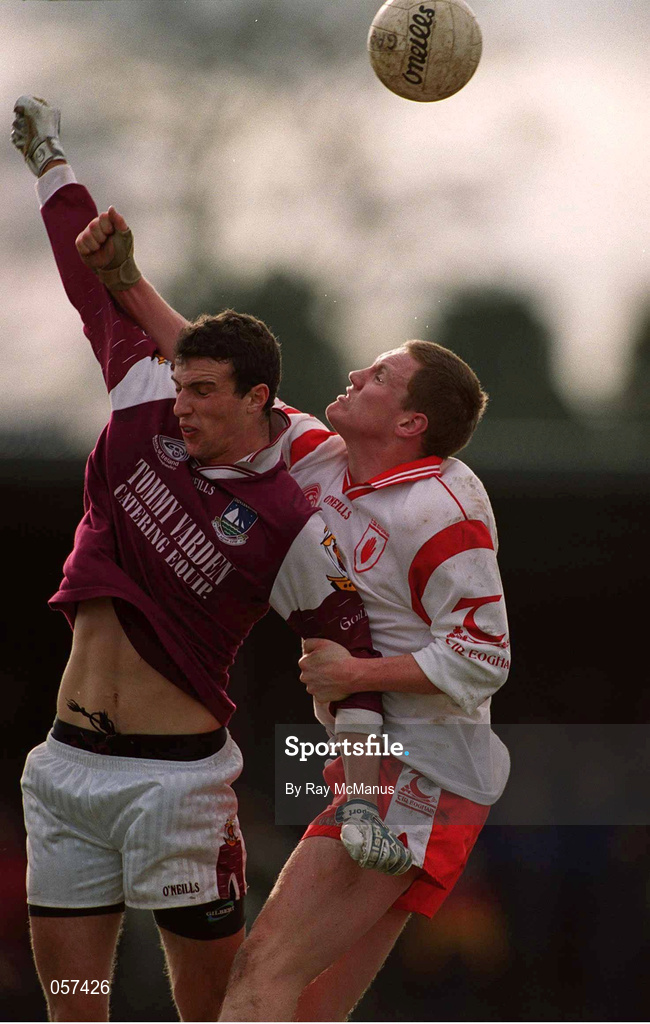 25 February 2001; Galway's Joe Bergin competes for a high ball with Cormac McAnallen of Tyrone during the Allianz National Football League Division 1A match between Galway and Tyrone at Duggan Park in Ballinasloe, Galway. Photo by Ray McManus/Sportsfile