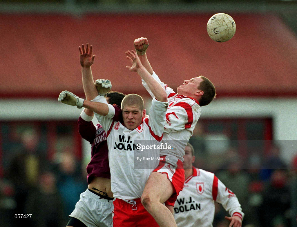 25 February 2001; Galway's Joe Bergin competes for a high ball with Kevin Hughes, centre, and Cormac McAnallen of Tyrone during the Allianz National Football League Division 1A match between Galway and Tyrone at Duggan Park in Ballinasloe, Galway. Photo by Ray McManus/Sportsfile