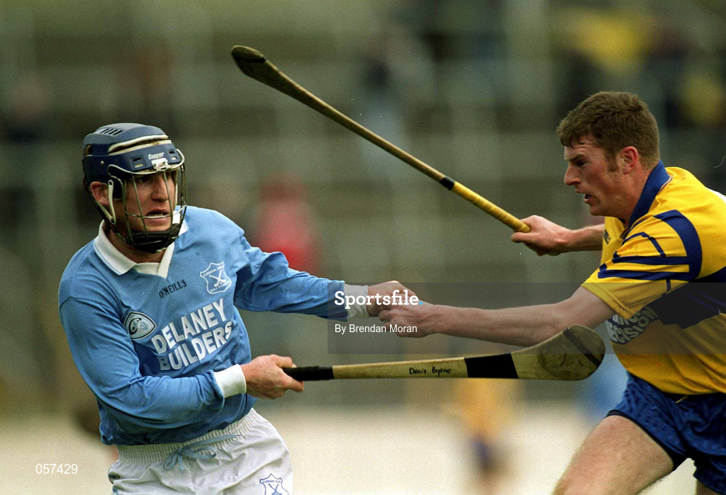 25 February 2001; Denis Byrne of Graigue Ballycallan holds off the challenge of Declan Murphy of Sixmilebridge during the AIB All-Ireland Senior Club Hurling Championship Semi-Final between Graigue Ballycallan and Sixmilebridge at Semple Stadium in Thurles, Tipperary. Photo by Brendan Moran/Sportsfile