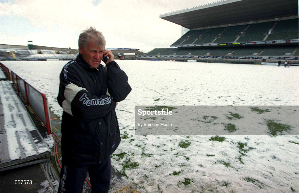 28 February 2001; Denmark manager Morten Olsen speaks on his phone at a snow covered Lansdowne Road in Dublin after it was the announced that the International Friendly match between Republic of Ireland and Denmark game would be postponed. Photo by Brendan Moran/Sportsfile