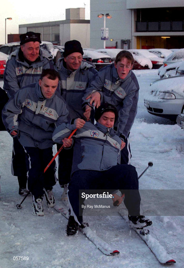28 February 2001; Warren Tate, from Stillorgan, Dublin assisted by colleagues, Finbarr Hughes from Tyrone, Cormac Maguire from Dublin, Jim Nugent from Armagh and Lorraine Whelan from Wicklow, slips during a "Practice Run" at Dublin Airport prior to their departure, to Alaska, as members of the Special Olympics Ireland Team prepare to compete in the 2001 Special Olympics World Winter Games which commence on the 4th of March. Photo by Ray McManus/Sportsfile