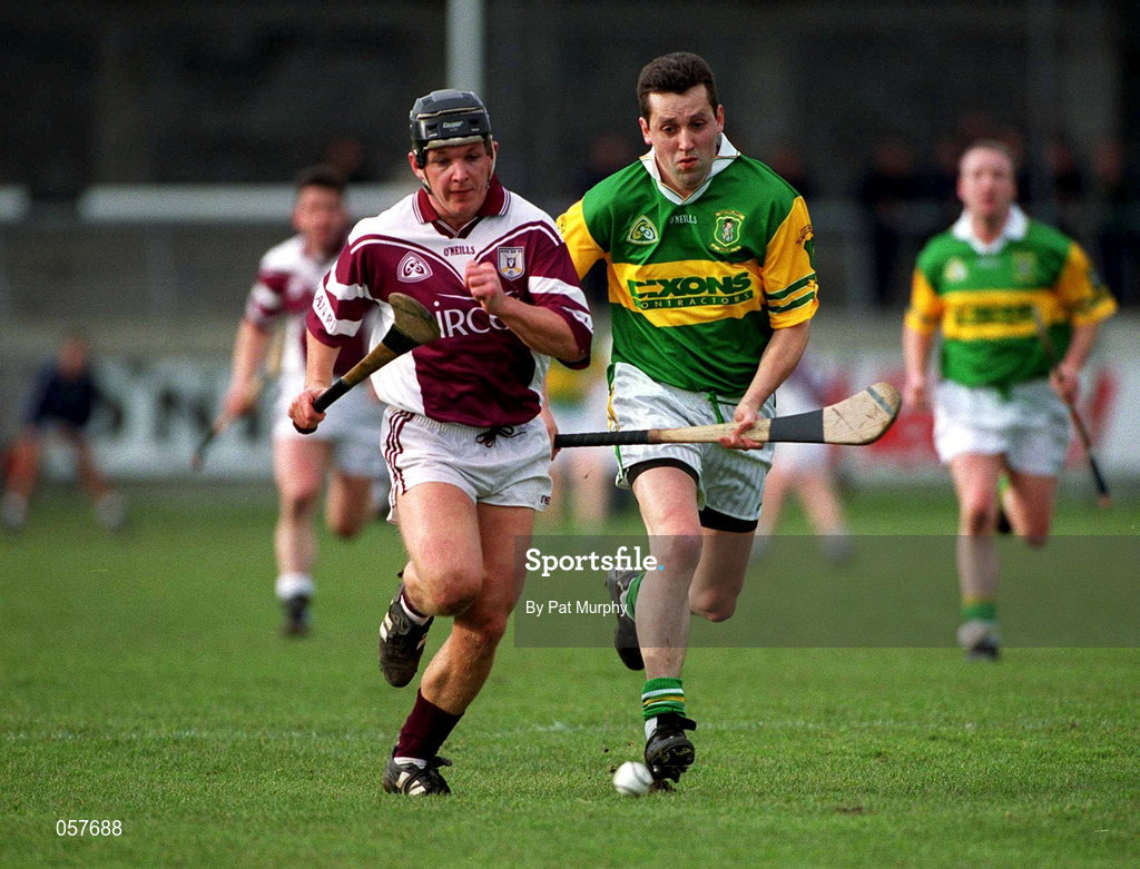25 February 2001; Cathal Moran of Athenry in action against Sean McIlhatton of Dunloy during the AIB All-Ireland Senior Club Hurling Championship Semi-Final match between Athenry and Dunloy at Parnell Park in Dublin. Photo by Pat Murphy/Sportsfile