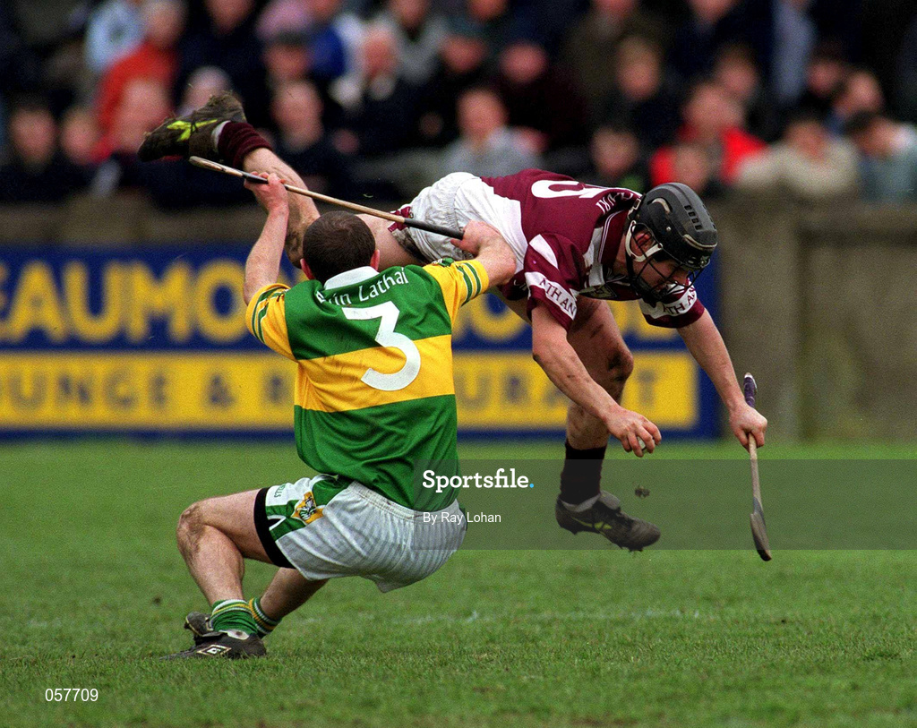 25 February 2001; Athenry's David Donogue in action against Sean Mullan of Dunloy during the AIB All-Ireland Senior Club Hurling Championship Semi-Final match between Athenry and Dunloy at Parnell Park in Dublin. Photo by Ray Lohan/Sportsfile