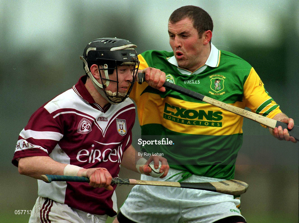 25 February 2001; Eugene Cloonan of Athenry is tackled by Seamus McMullan of Dunloy during the AIB All-Ireland Senior Club Hurling Championship Semi-Final match between Athenry and Dunloy at Parnell Park in Dublin. Photo by Ray Lohan/Sportsfile