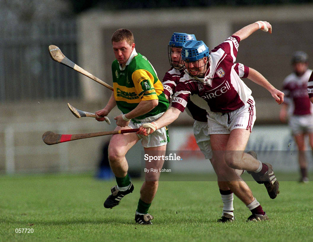 25 February 2001; Seamus McMullan of Dunloy is tackled by Paul Hardiman and Brian Hanley of Athenry during the AIB All-Ireland Senior Club Hurling Championship Semi-Final match between Athenry and Dunloy at Parnell Park in Dublin. Photo by Ray Lohan/Sportsfile