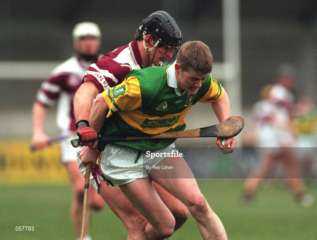 25 February 2001; Malachy Molloy of Dunloy is tackled by Joe Rabbitte of Athenry during the AIB All-Ireland Senior Club Hurling Championship Semi-Final match between Athenry and Dunloy at Parnell Park in Dublin. Photo by Ray Lohan/Sportsfile