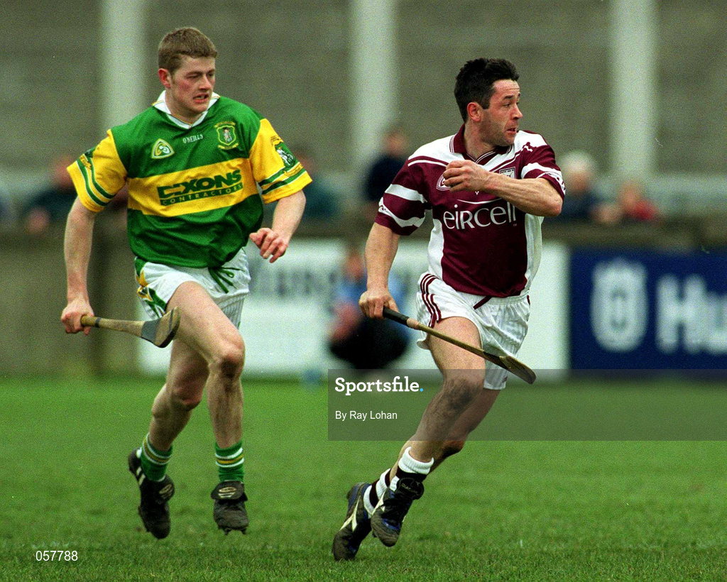 25 February 2001; Pat Higgins of Athenry in action against Malachy Molloy of Dunloy during the AIB All-Ireland Senior Club Hurling Championship Semi-Final match between Athenry and Dunloy at Parnell Park in Dublin. Photo by Ray Lohan/Sportsfile