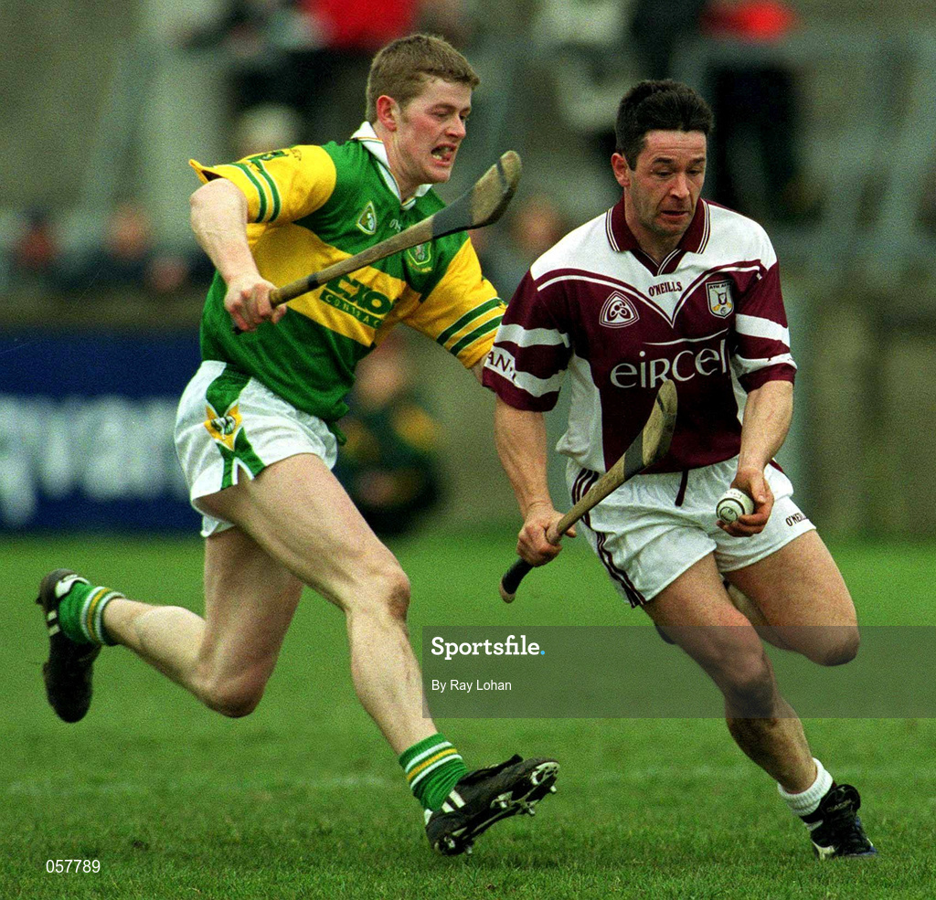 25 February 2001; Pat Higgins of Athenry in action against Malachy Molloy of Dunloy during the AIB All-Ireland Senior Club Hurling Championship Semi-Final match between Athenry and Dunloy at Parnell Park in Dublin. Photo by Ray Lohan/Sportsfile