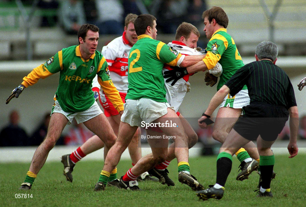 25 February 2001; Johnny McBride of Derry under pressure from Meath players Mark O'Reilly, 2, Darren Fay and Hank Traynor during the Allianz National Football League Division 1B match between Meath and Derry at Páirc Tailteann in Navan, Meath. Photo by Damien Eagers/Sportsfile
