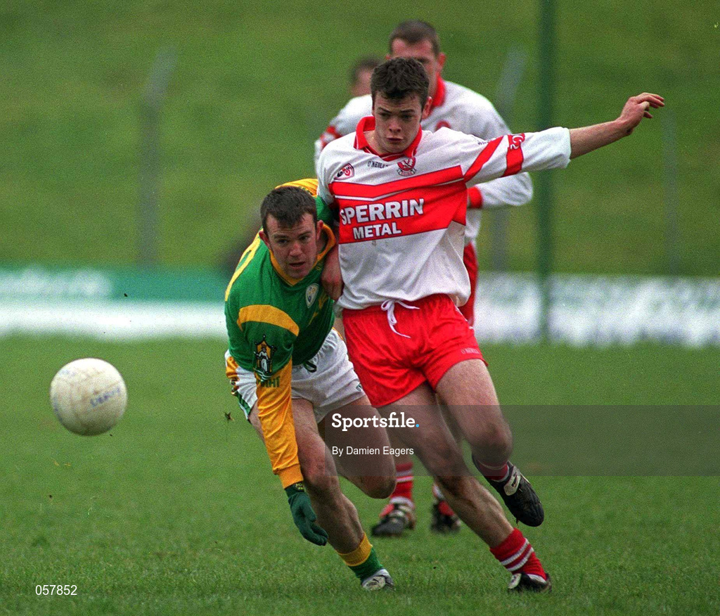 25 February 2001; Evan Kelly of Meath is tackled by Paul McFlynn of Derry during the Allianz National Football League Division 1B match between Meath and Derry at Páirc Tailteann in Navan, Meath. Photo by Damien Eagers/Sportsfile