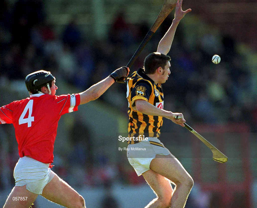 24 February 2001; JP Corcoran of Kilkenny in action against John Browne of Cork during the Allianz National Hurling League Division 1B match between Cork and Kilkenny at Páirc Uí Chaoimh in Cork. Photo by Ray McManus/Sportsfile