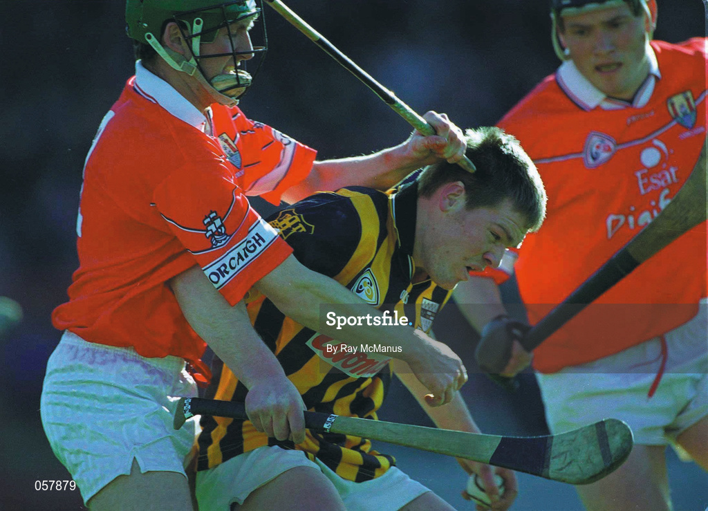 24 February 2001; Tom Drennan of Kilkenny in action against Pat Mulcahy of Cork during the Allianz National Hurling League Division 1B match between Cork and Kilkenny at Páirc Uí Chaoimh in Cork. Photo by Ray McManus/Sportsfile