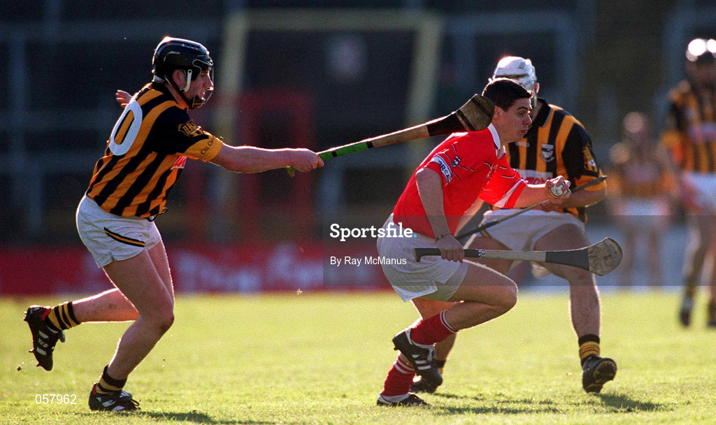 24 February 2001; Neil Ronan of Cork in action against Jimmy Coogan of Kilkenny during the Allianz National Hurling League Division 1B match between Cork and Kilkenny at Páirc Uí Chaoimh in Cork. Photo by Ray McManus/Sportsfile