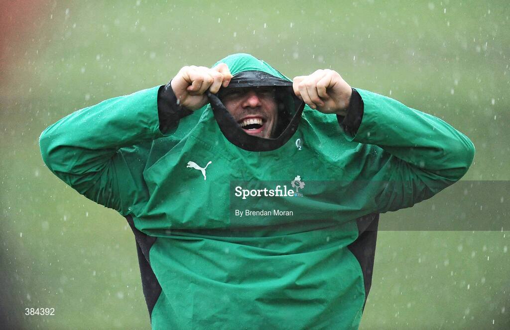 4 November 2009; Flanker Stephen Ferris shelters from the heavy rain during Ireland rugby squad training. University of Limerick, Limerick. Picture credit: Brendan Moran / SPORTSFILE
