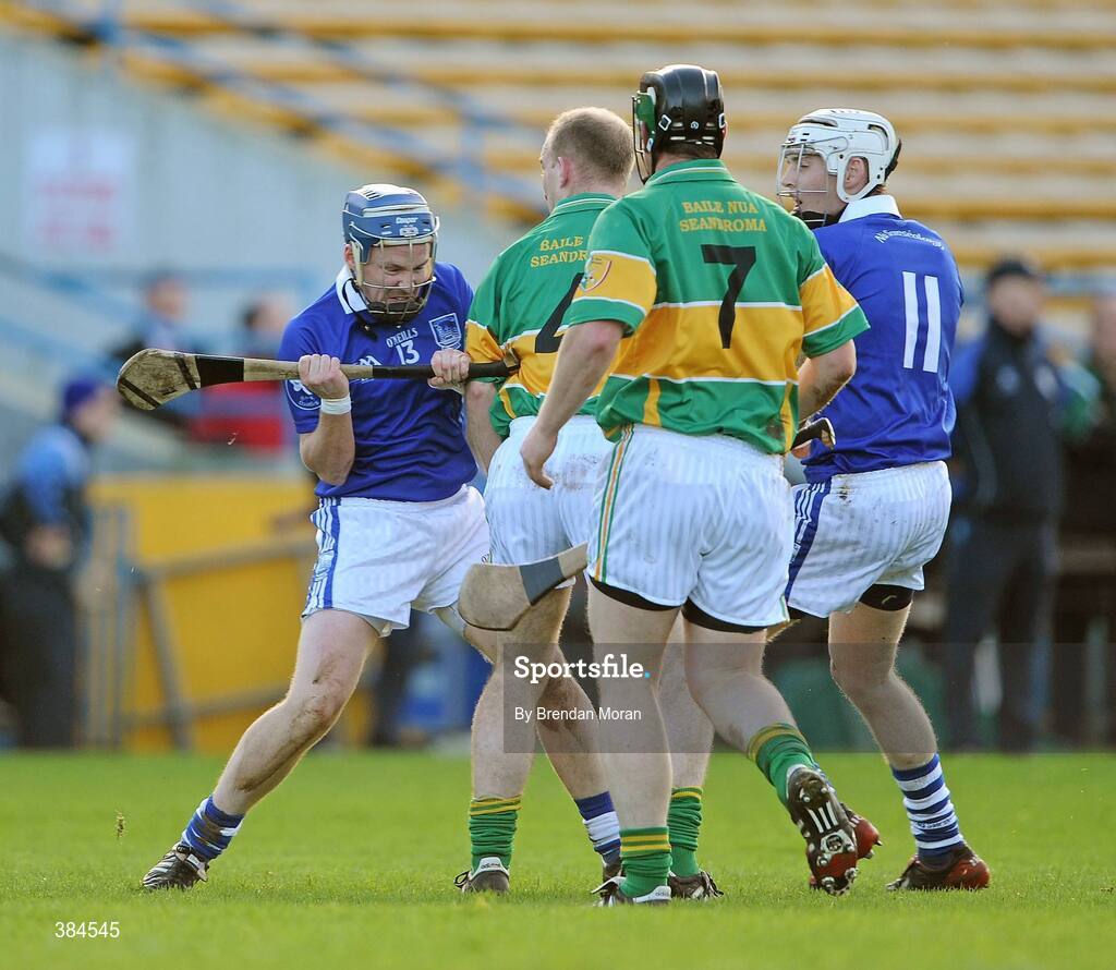 1 November 2009; Ritchie Ryan, 13, Thurles Sarsfields, gets involved in an altercation with Dermot Gleeson, 4, Newtownshandrum, for which both players were shown a yellow card by referee Ger Hoey. AIB GAA Hurling Munster Senior Club Championship Quarter-Final, Thurles Sarsfields v Newtownshandrum, Semple Stadium, Thurles, Co. Tipperary. Picture credit: Brendan Moran / SPORTSFILE