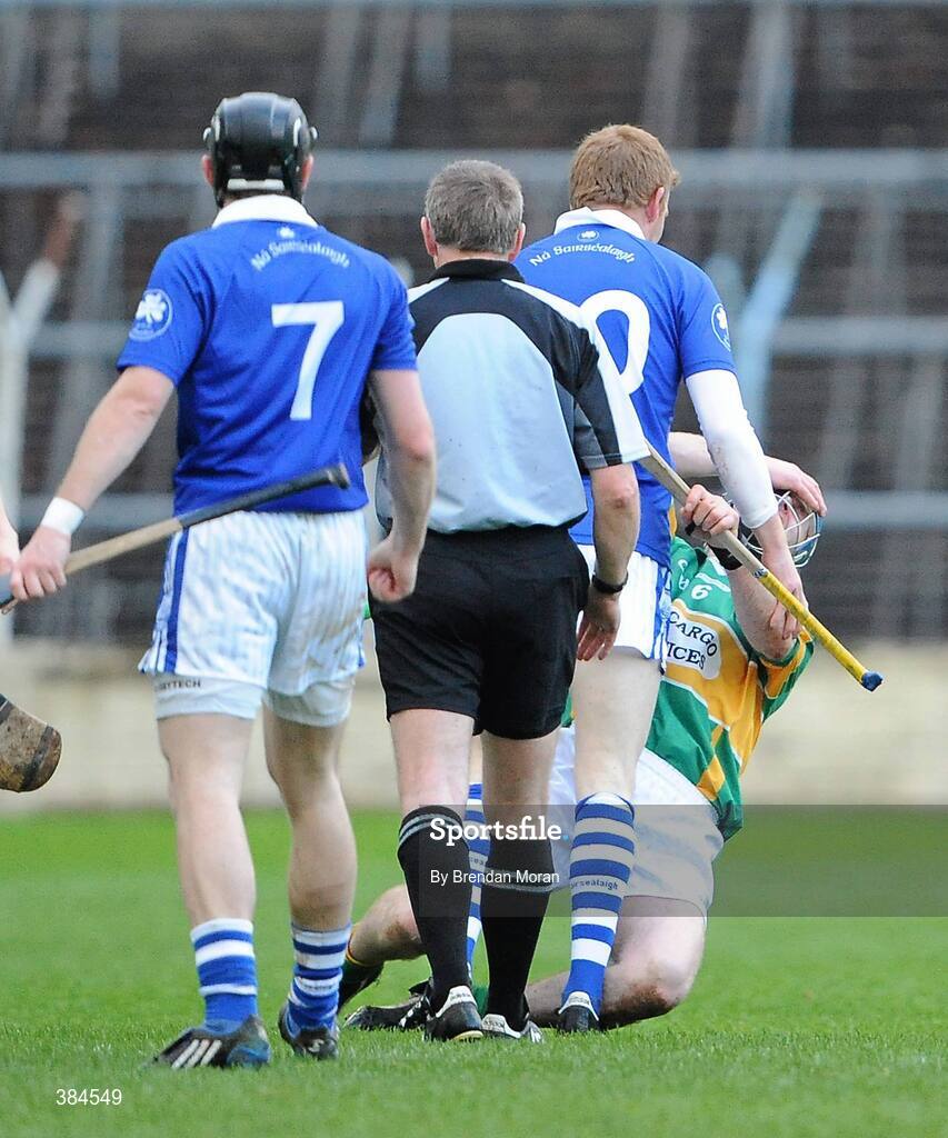 1 November 2009; Pat Mulcahy, Newtownshandrum, falls after a clash with Ger O'Grady, Thurles Sarsfields. AIB GAA Hurling Munster Senior Club Championship Quarter-Final, Thurles Sarsfields v Newtownshandrum, Semple Stadium, Thurles, Co. Tipperary. Picture credit: Brendan Moran / SPORTSFILE