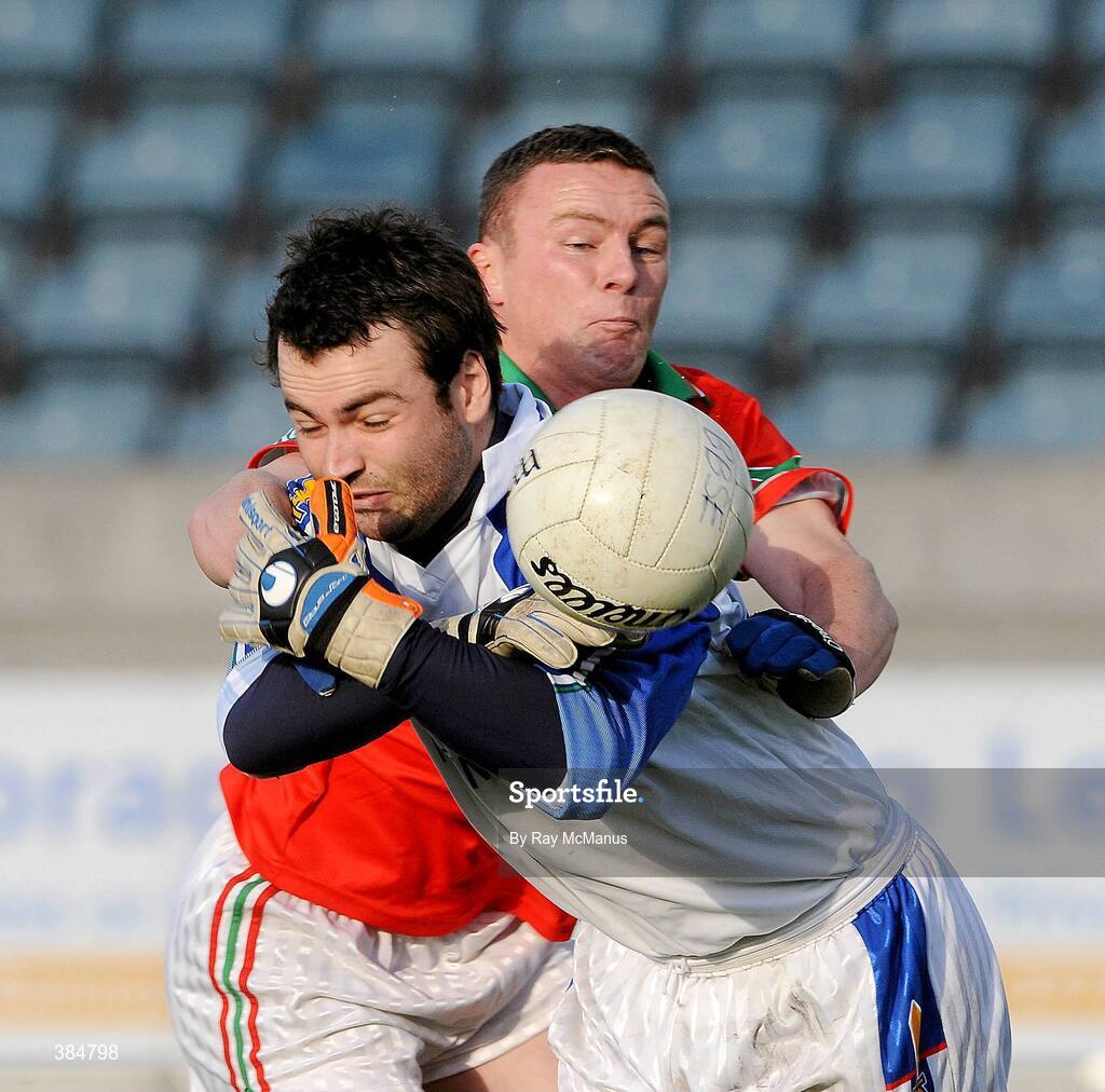 8 November 2009; Ballyboden St. Enda's goalkeeper Daire Walsh under pressure from Rathnew corner forward Leighton Glynn. AIB GAA Football Leinster Senior Club Championship Quarter-Final, Ballyboden St. Enda's v Rathnew, Parnell Park, Dublin. Picture credit: Ray McManus / SPORTSFILE