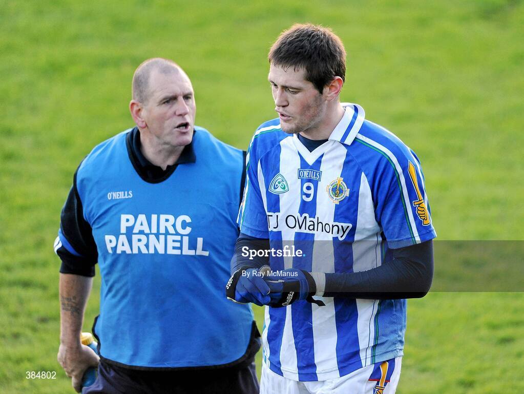 8 November 2009; The Ballyboden St. Enda's captain Declan O'Mahony is comforted by club physio David Cunningham after he was shown a red card late in the game. AIB GAA Football Leinster Senior Club Championship Quarter-Final, Ballyboden St. Enda's v Rathnew, Parnell Park, Dublin. Picture credit: Ray McManus / SPORTSFILE