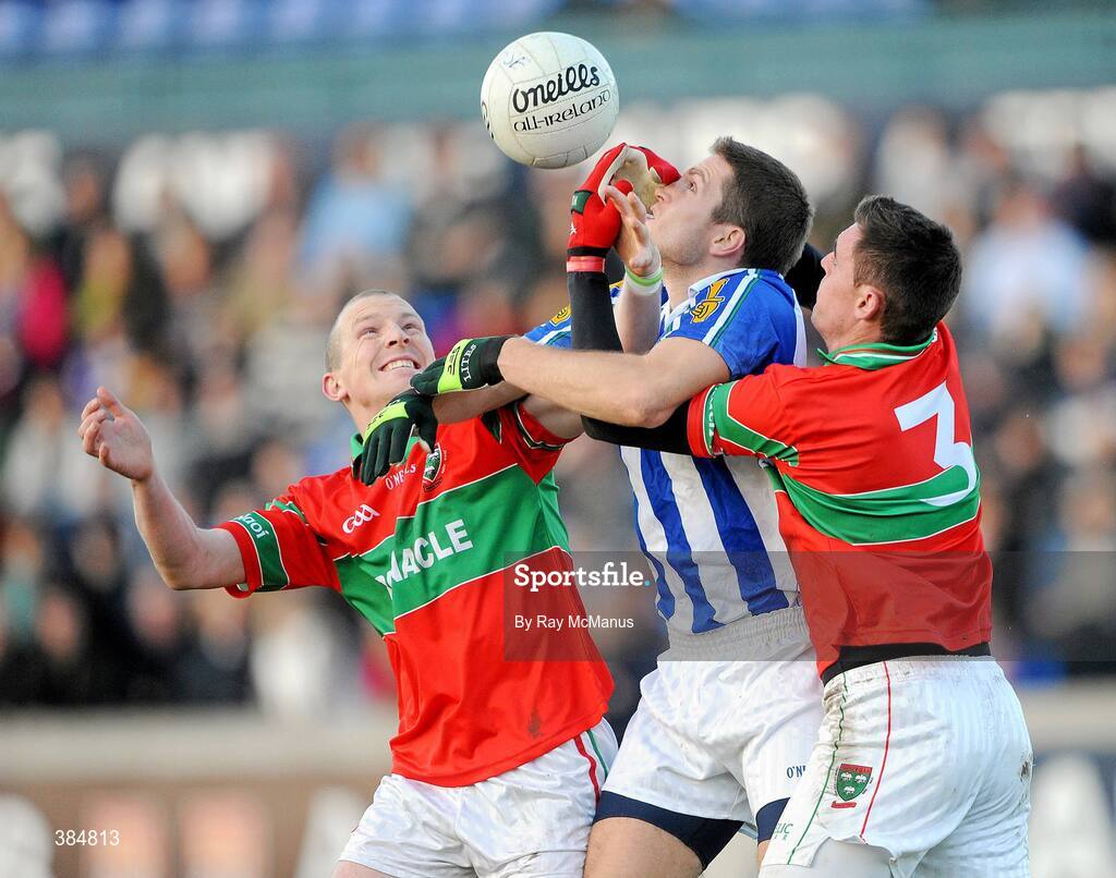 8 November 2009; Conal Keaney, Ballyboden St. Enda's, between Rathnew players Stephen Byrne, left, and full-back Damien Power. AIB GAA Football Leinster Senior Club Championship Quarter-Final, Ballyboden St. Enda's v Rathnew, Parnell Park, Dublin. Picture credit: Ray McManus / SPORTSFILE