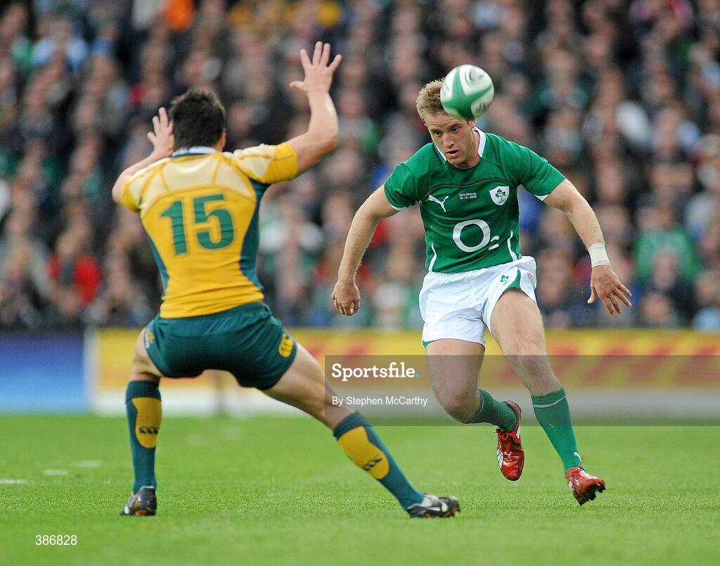 15 November 2009; Luke Fitzgerald, Ireland, kicks ahead of Adam Ashley-Cooper, Australia. Autumn International Guinness Series 2009, Ireland v Australia, Croke Park, Dublin. Picture credit: Stephen McCarthy / SPORTSFILE