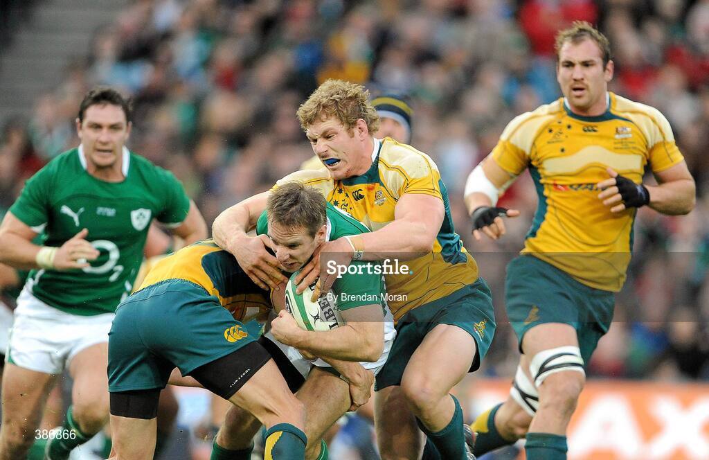 15 November 2009; Tomas O'Leary, Ireland, is tackled by Matt Giteau, left, and David Pocock, Australia. Autumn International Guinness Series 2009, Ireland v Australia, Croke Park, Dublin. Picture credit: Brendan Moran / SPORTSFILE