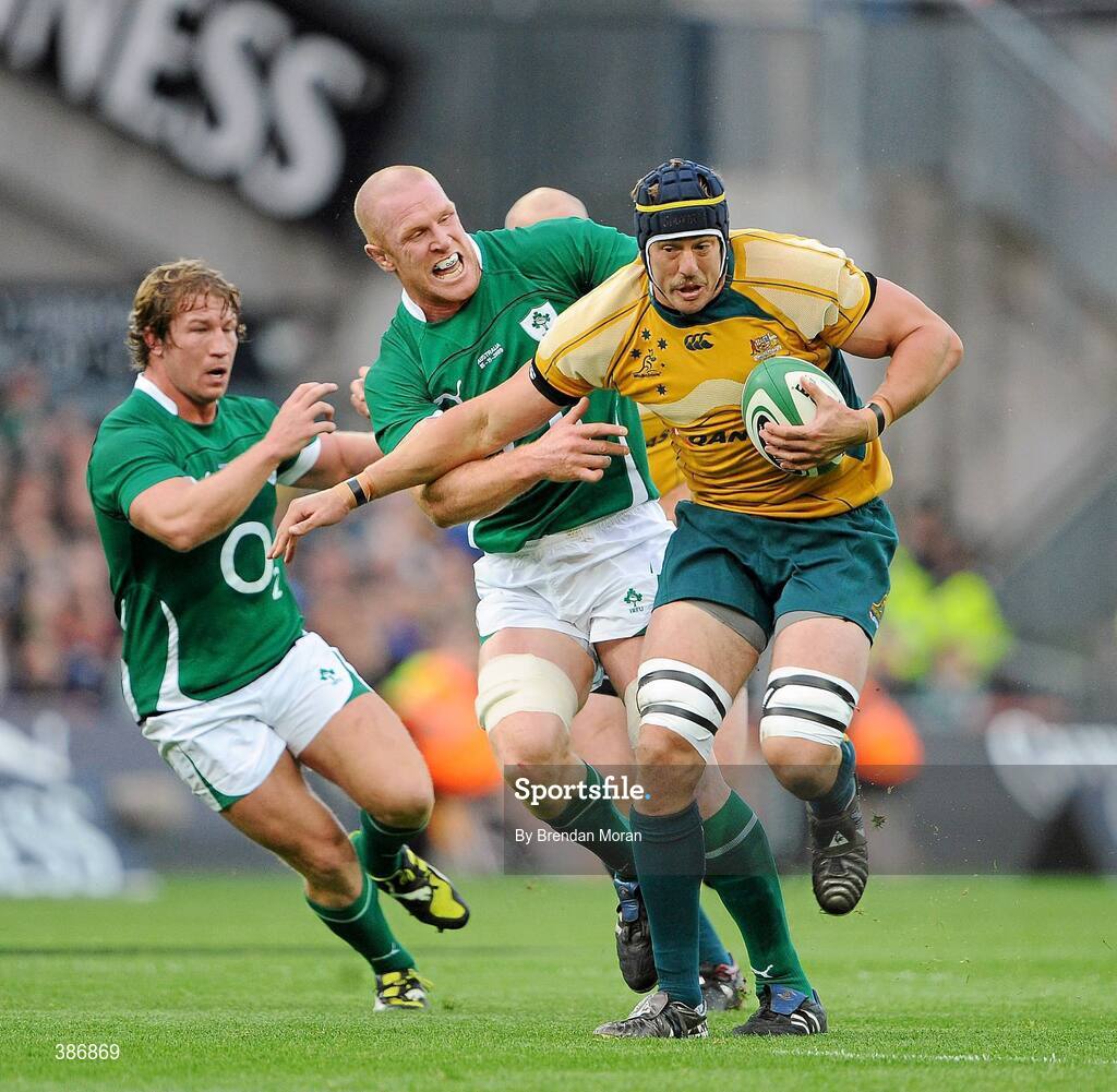 15 November 2009; Mark Chisholm, Australia, holds off the tackle of Paul O'Connell, Ireland. Autumn International Guinness Series 2009, Ireland v Australia, Croke Park, Dublin. Picture credit: Brendan Moran / SPORTSFILE
