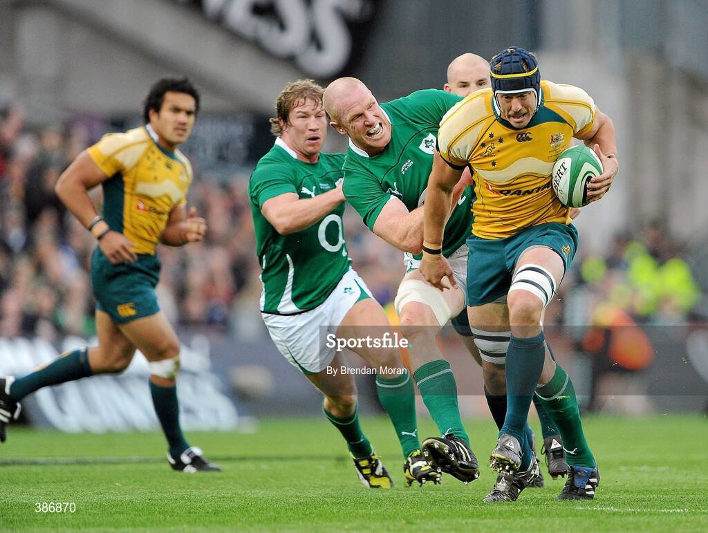 15 November 2009; Mark Chisholm, Australia, holds off the tackle of Paul O'Connell, Ireland. Autumn International Guinness Series 2009, Ireland v Australia, Croke Park, Dublin. Picture credit: Brendan Moran / SPORTSFILE