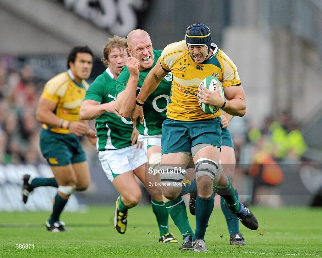 15 November 2009; Mark Chisholm, Australia, holds off the tackle of Paul O'Connell, Ireland. Autumn International Guinness Series 2009, Ireland v Australia, Croke Park, Dublin. Picture credit: Brendan Moran / SPORTSFILE