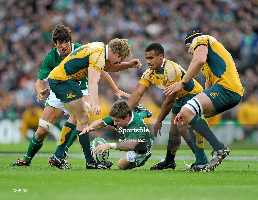 15 November 2009; Ronan O'Gara, Ireland, in action against, from left to right, Peter Hynes, Will Genia and Mark Chisholm, Australia. Autumn International Guinness Series 2009, Ireland v Australia, Croke Park, Dublin. Picture credit: Stephen McCarthy / SPORTSFILE