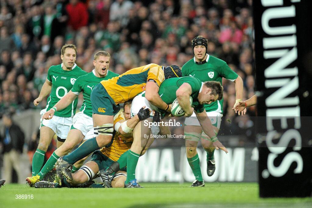 15 November 2009; Cian Healy, Ireland, is tackled by Mark Chisholm and Rocky Elsom, Australia. Autumn International Guinness Series 2009, Ireland v Australia, Croke Park, Dublin. Picture credit: Stephen McCarthy / SPORTSFILE