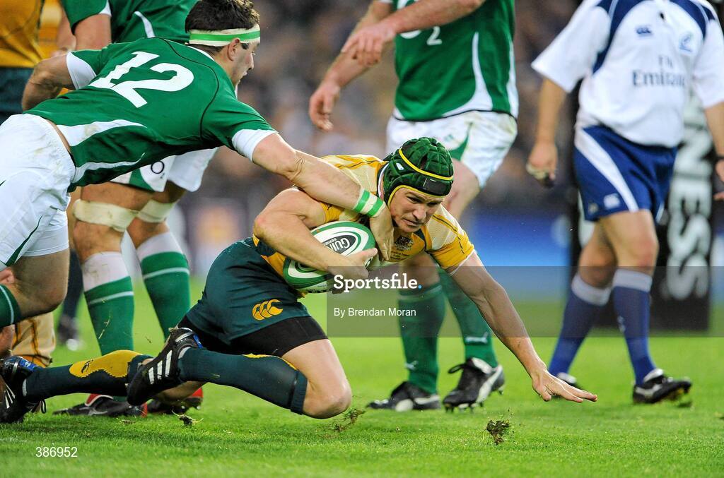 15 November 2009; Matt Giteau, Australia, is tackled by Paddy Wallace, Ireland. Autumn International Guinness Series 2009, Ireland v Australia, Croke Park, Dublin. Picture credit: Brendan Moran / SPORTSFILE