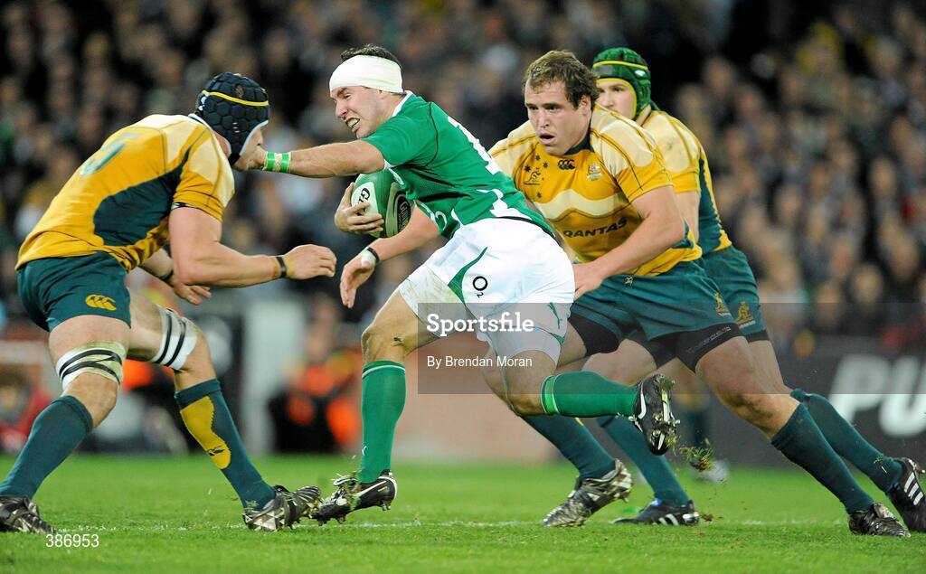15 November 2009; Paddy Wallace, Ireland, in action against Mark Chisholm, left, and Ben Alexander, Australia. Autumn International Guinness Series 2009, Ireland v Australia, Croke Park, Dublin. Picture credit: Brendan Moran / SPORTSFILE
