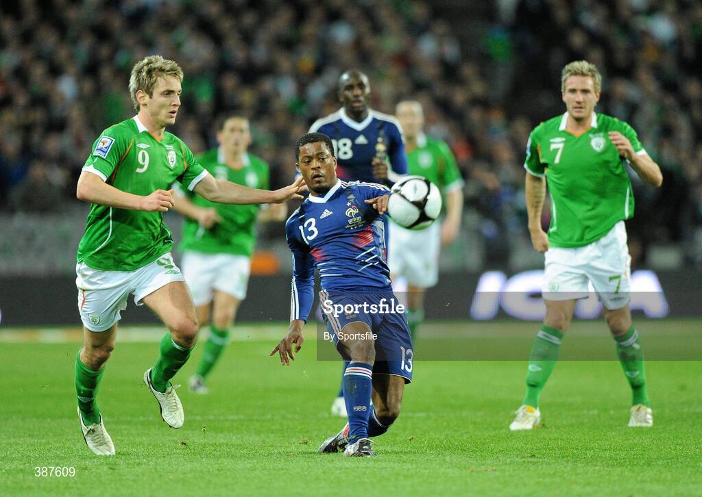 14 November 2009; Patrice Evra, France, in action against Kevin Doyle, Republic of Ireland. FIFA 2010 World Cup Qualifying Play-off 1st Leg, Republic of Ireland v France, Croke Park, Dublin. Photo by Sportsfile