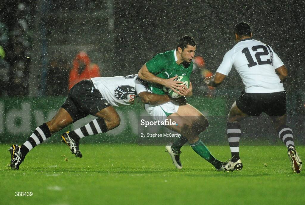 21 November 2009; Rob Kearney, Ireland, is tackled by Vereniki Goneva, left and Seremaia Bai, Fiji. Autumn International Guinness Series 2009, Ireland v Fiji, Royal Dublin Society, Ballsbridge, Dublin. Picture credit: Stephen McCarthy / SPORTSFILE