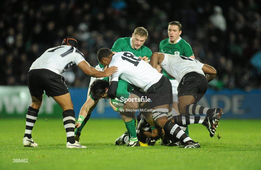 21 November 2009; Shane Horgan, Ireland, supported by team mates, Jamie Heaslip and Eoin Reddan, right, is tackled by Fiji players from left, Akapusi Qera, Leone Nakarawa and Viliame Veikoso. Autumn International Guinness Series 2009, Ireland v Fiji, Royal Dublin Society, Ballsbridge, Dublin. Picture credit: Stephen McCarthy / SPORTSFILE