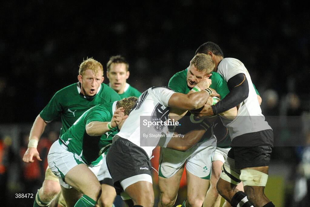 21 November 2009; Jamie Heaslip, Ireland, is tackled by Samu Bola, left, and Asaeli Boko, right, Fiji. Autumn International Guinness Series 2009, Ireland v Fiji, Royal Dublin Society, Ballsbridge, Dublin. Picture credit: Stephen McCarthy / SPORTSFILE