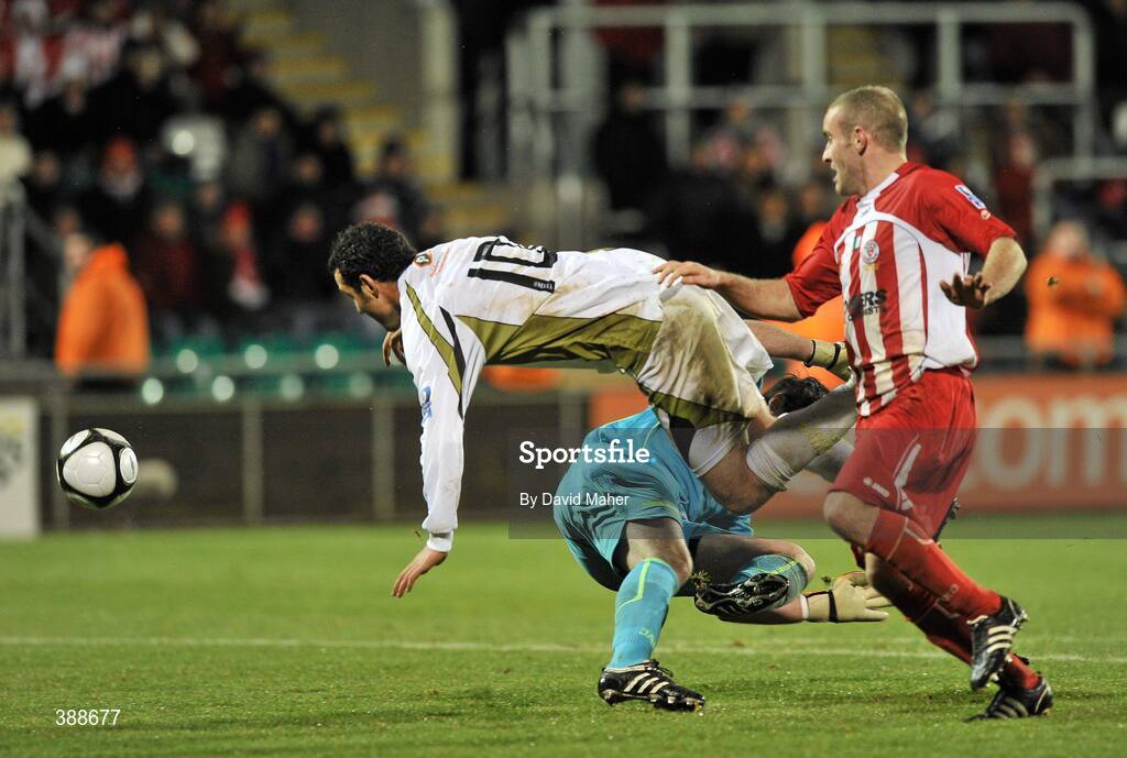 22 November 2009; Sligo Rovers goalkeeper Ciaran Kelly, fouls Eamon Zayed, Sporting Fingal, for a penalty that was scored by Sporting Fingal's Colm James. FAI Ford Cup Final, Sligo Rovers v Sporting Fingal, Tallaght Stadium, Dublin. Picture credit: David Maher / SPORTSFILE