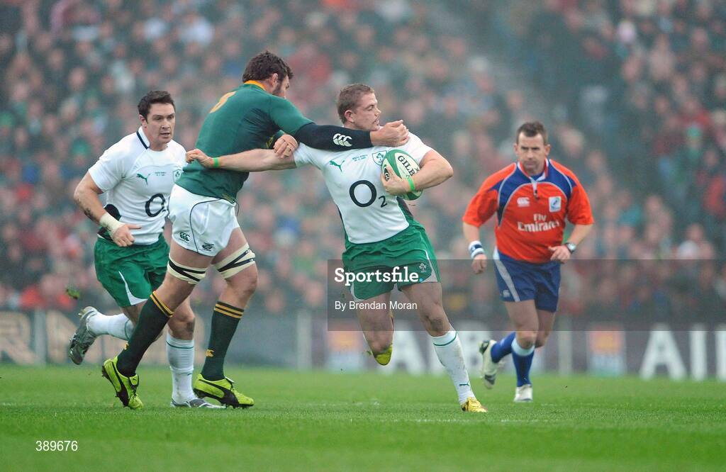 28 November 2009; Jamie Heaslip, Ireland, is tackled by Danie Rossouw, South Africa. Autumn International Guinness Series 2009, Ireland v South Africa, Croke Park, Dublin. Picture credit: Brendan Moran / SPORTSFILE