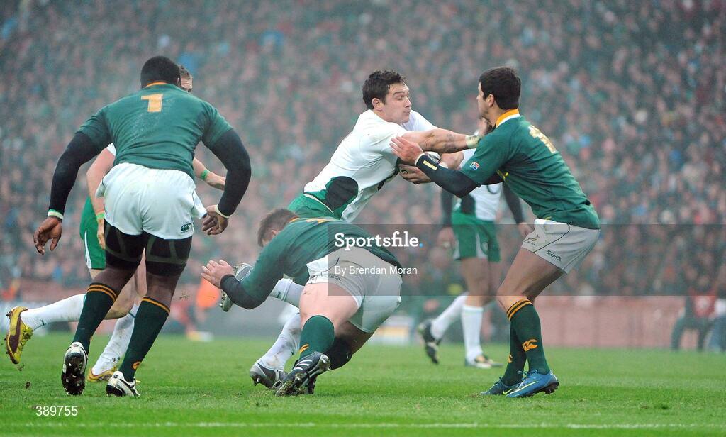 28 November 2009; David Wallace, Ireland, is tackled by John Smit and Morne Steyn, South Africa. Autumn International Guinness Series 2009, Ireland v South Africa, Croke Park, Dublin. Picture credit: Brendan Moran / SPORTSFILE