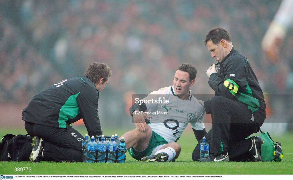 28 November 2009; Paddy Wallace, Ireland, is attended to by team physio Cameron Steele, left, and team doctor Dr. Michael Webb. Autumn International Guinness Series 2009, Ireland v South Africa, Croke Park, Dublin. Picture credit: Brendan Moran / SPORTSFILE