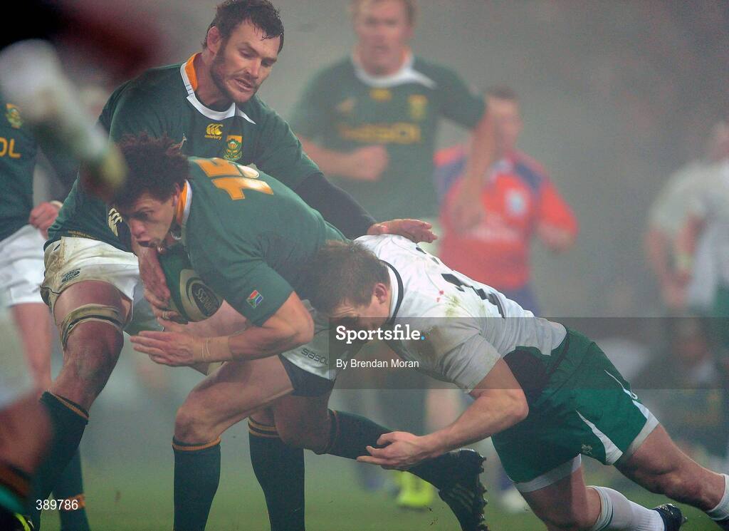 28 November 2009; Zane Kirtchner, South Africa, is tackled by Ireland captain Brian O'Driscoll in the last play of the game. Autumn International Guinness Series 2009, Ireland v South Africa, Croke Park, Dublin. Picture credit: Brendan Moran / SPORTSFILE