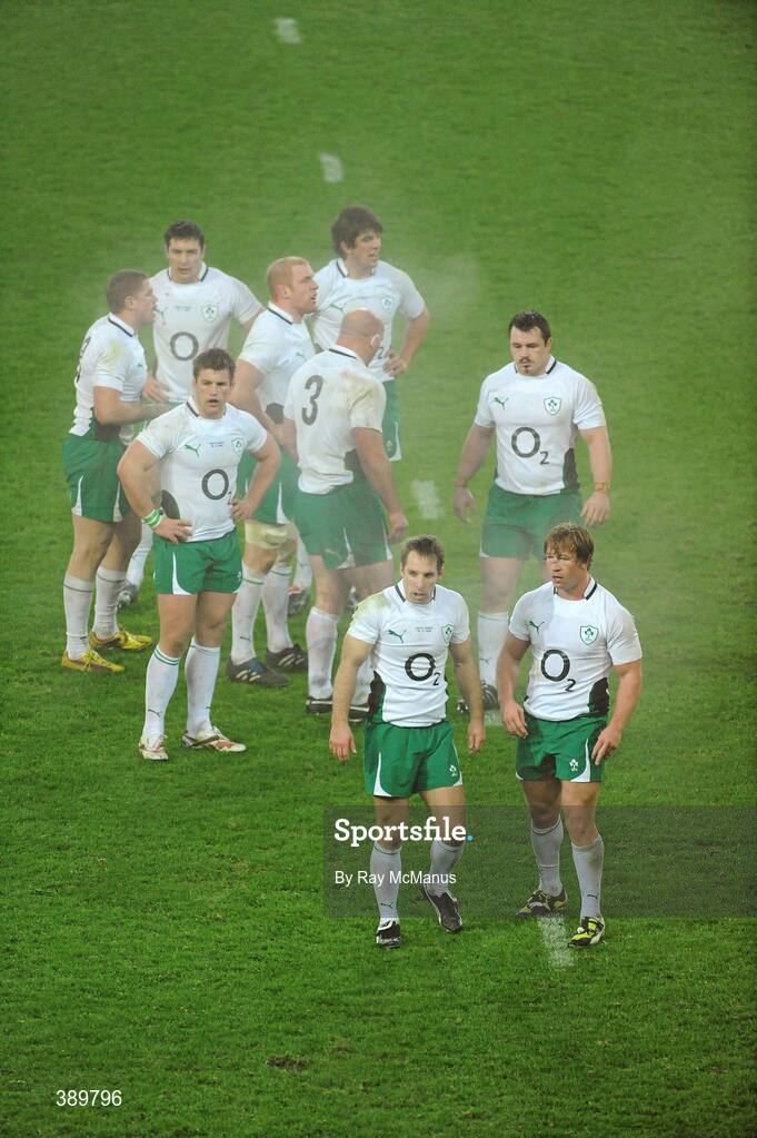 28 November 2009; The Ireland players take a breather while a team-mate is attended to. Autumn International Guinness Series 2009, Ireland v South Africa, Croke Park, Dublin. Picture credit: Ray McManus / SPORTSFILE