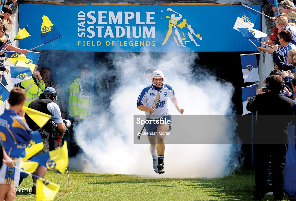12 July 2009; Not men but giants. Munster hurling final day. Stephen Molumphy leads his Waterford team into the light. Picture credit: Brendan Moran / SPORTSFILE   This image may be reproduced free of charge when used in conjunction with a review of the book "A Season of Sundays 2009". All other usage © SPORTSFILE