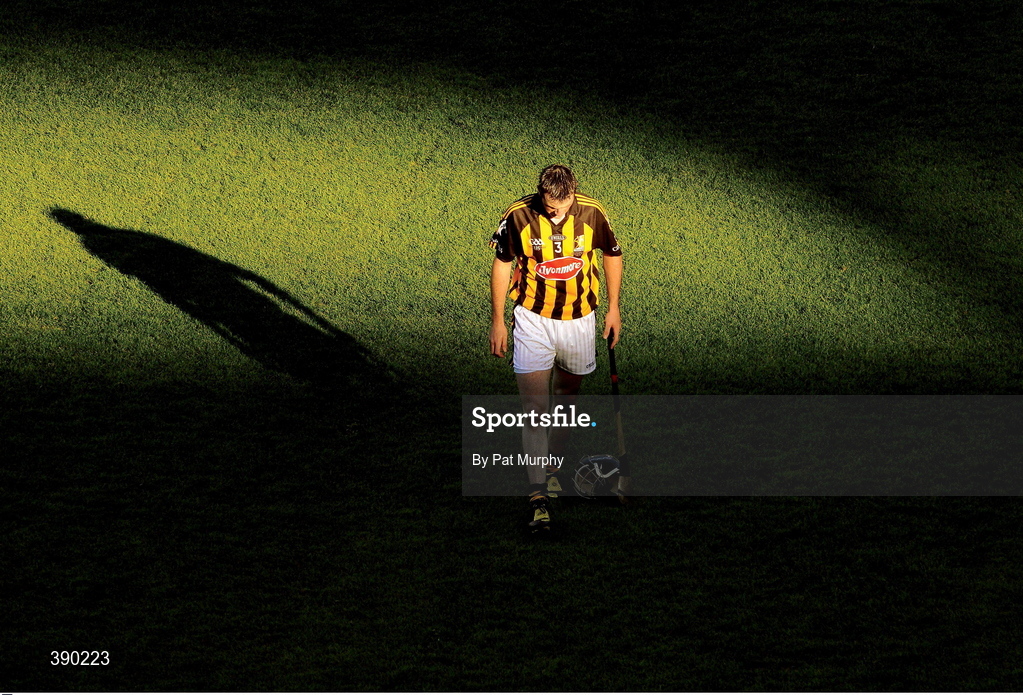13 Septermber 2009; Defeat casts a long shadow. Kilkenny full back Paddy Nolan leaves the Croke Park pitch after his side’s defeat to Clare in the All-Ireland under-21 hurling final. Picture credit: Pat Murphy / SPORTSFILE      This image may be reproduced free of charge when used in conjunction with a review of the book "A Season of Sundays 2009". All other usage © SPORTSFILE