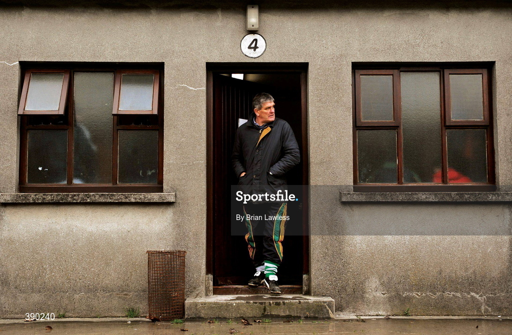 4 January 2009; Before the deluge. Offaly manager Richie Connor samples the air outside the Tullamore dressing rooms. Picture credit: Brian Lawless / SPORTSFILE      This image may be reproduced free of charge when used in conjunction with a review of the book "A Season of Sundays 2009". All other usage © SPORTSFILE