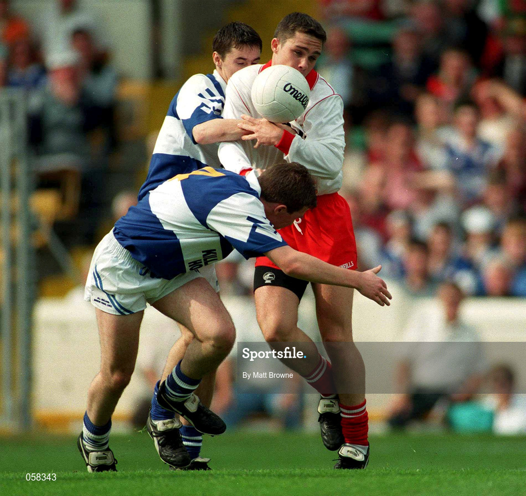 27 September 1998; Richard Thornton of Tyrone is tackled by Eoin Bland of Laois during the All-Ireland Minor Football Championship Final match between Laois and Tyrone at Croke Park in Dublin. Photo by Matt Browne/Sportsfile