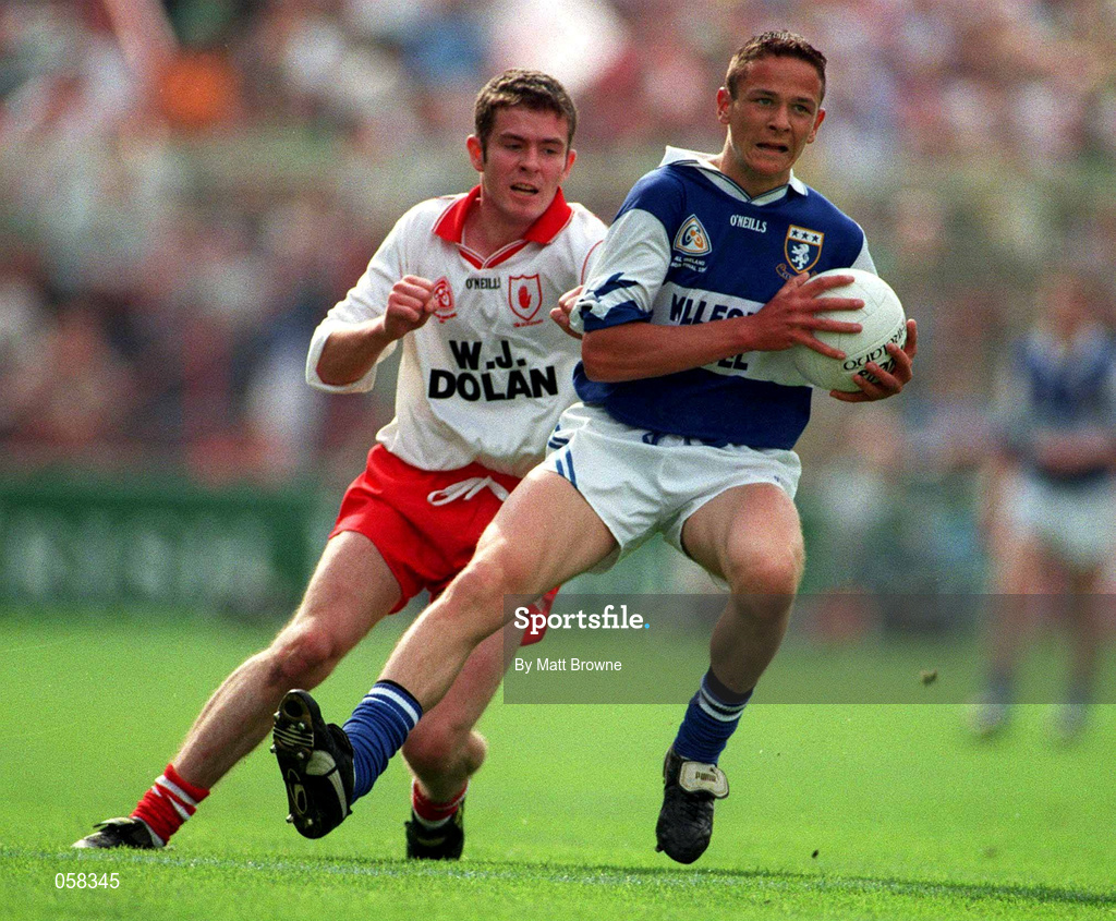 28 September 1998; Tom Kelly of Laois is tackled by Aidan Ball of Tyrone during the All-Ireland Minor Football Championship Final match between Laois and Tyrone at Croke Park in Dublin. Photo by Matt Browne/Sportsfile