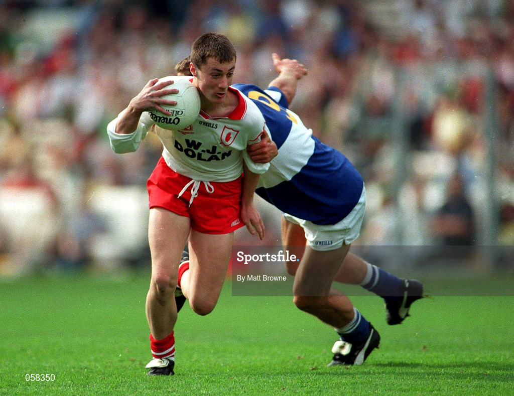 27 September 1998; Brian McGuigan of Tyrone is tackled by Darren Rooney of Laois during the All-Ireland Minor Football Championship Final match between Laois and Tyrone at Croke Park in Dublin. Photo by Matt Browne/Sportsfile