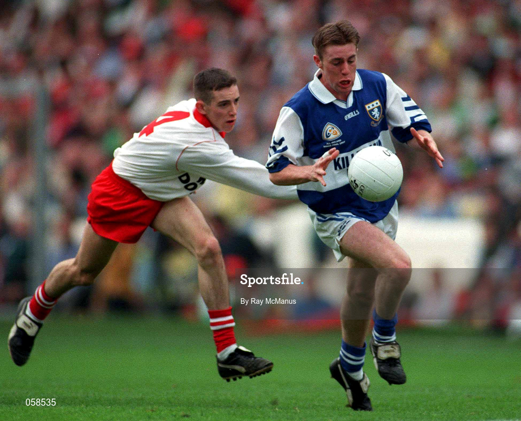 28 September 1997; Kieran Kelly of Laois in action against Brendan Donnelly of Tyrone during the All-Ireland Minor Football Championship Final match between Laois and Tyrone at Croke Park in Dublin. Photo by Ray McManus/Sportsfile