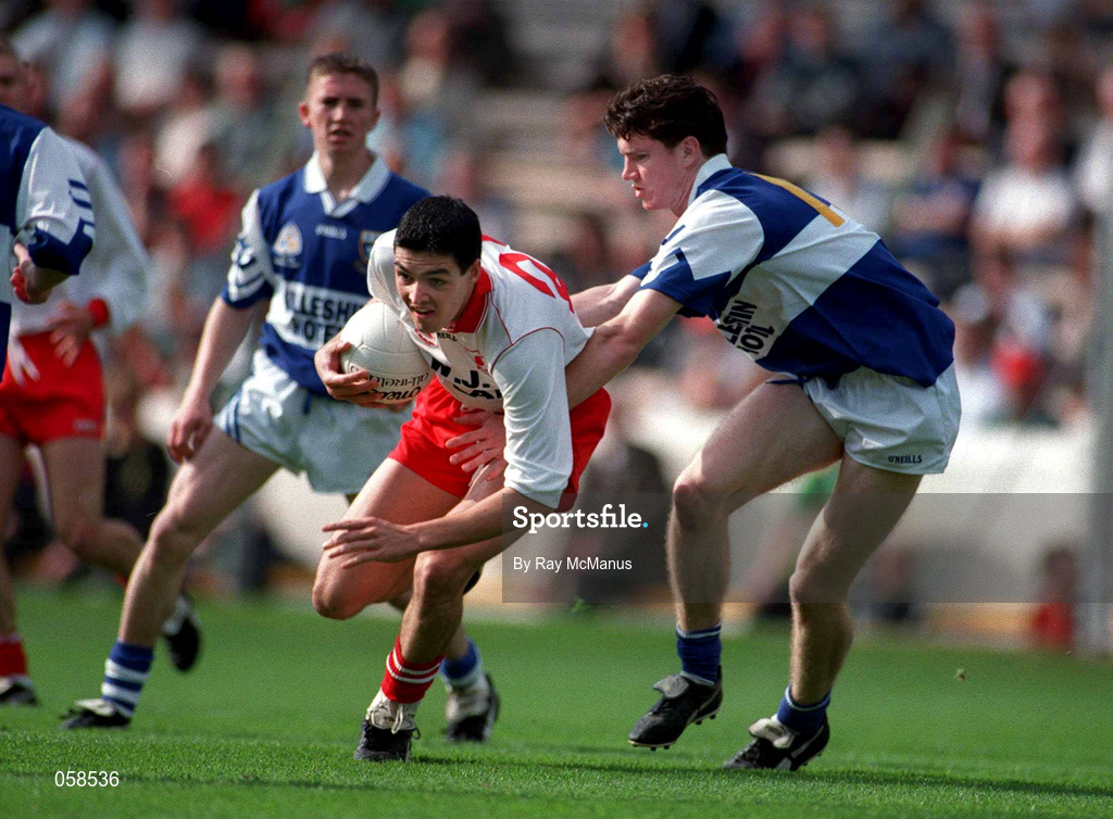 28 September 1997; Darren O'Henlon of Tyrone in action against Mark Hovenden of Laois during the All-Ireland Minor Football Championship Final match between Laois and Tyrone at Croke Park in Dublin. Photo by Ray McManus/Sportsfile